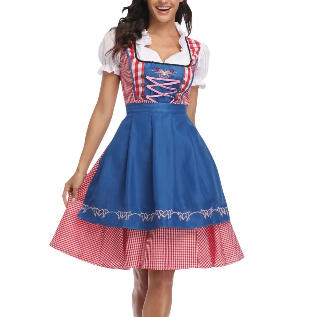 Femme en mouvement tenant sa jupe, robe à carreaux rouges avec tablier bleu vif brodé de cÅ“urs et corsage lacé rose. 3