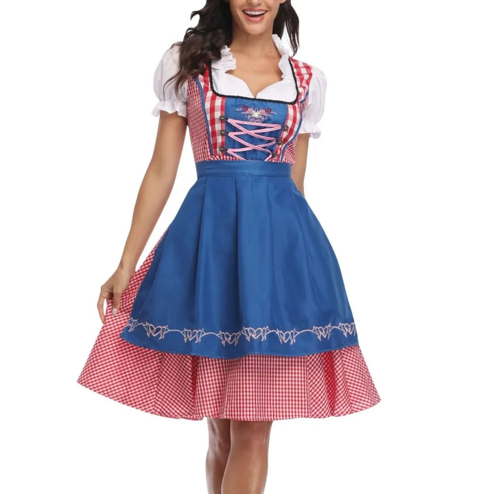 Femme en mouvement tenant sa jupe, robe à carreaux rouges avec tablier bleu vif brodé de cÅ“urs et corsage lacé rose. 3