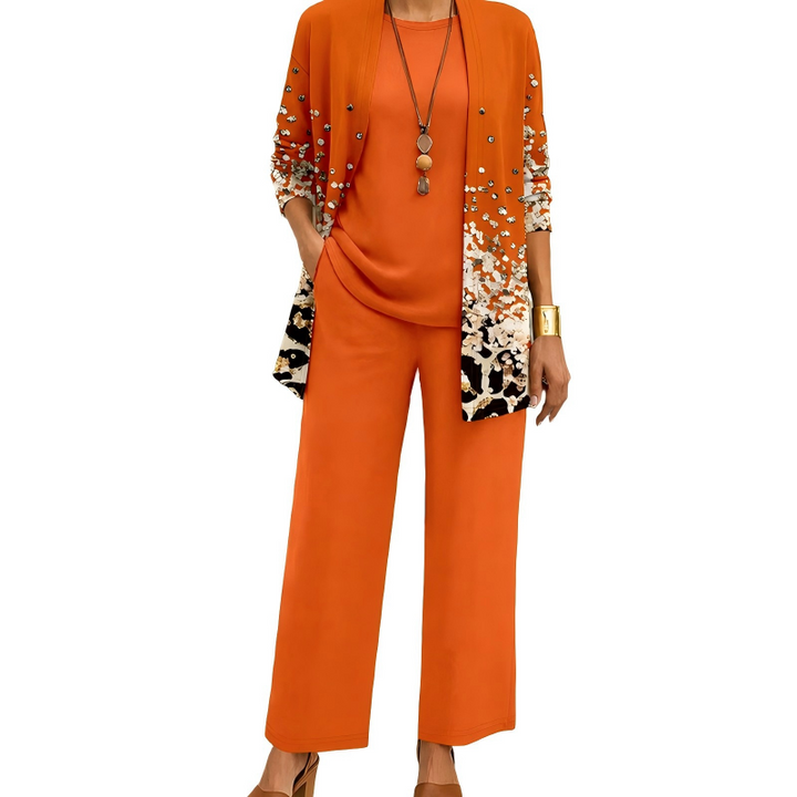 Version orange vif, cardigan long à motif dégradé de petits éclats et imprimé animal en bas, haut et pantalon larges unis. 3