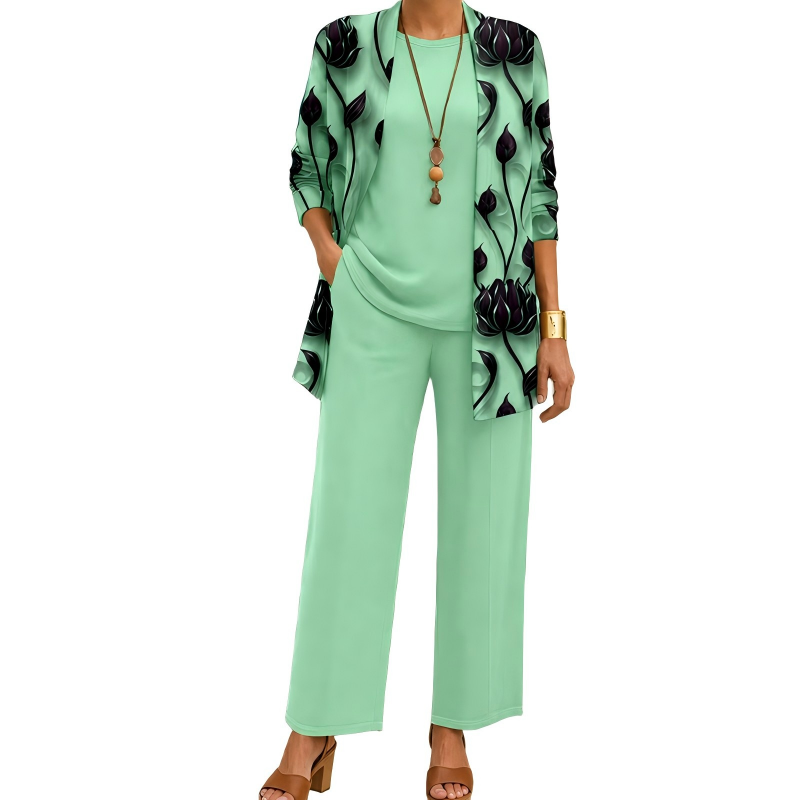 Ensemble vert menthe, cardigan long à fleurs sombres, haut rond uni, pantalon large et bracelet doré, vu de face. 6