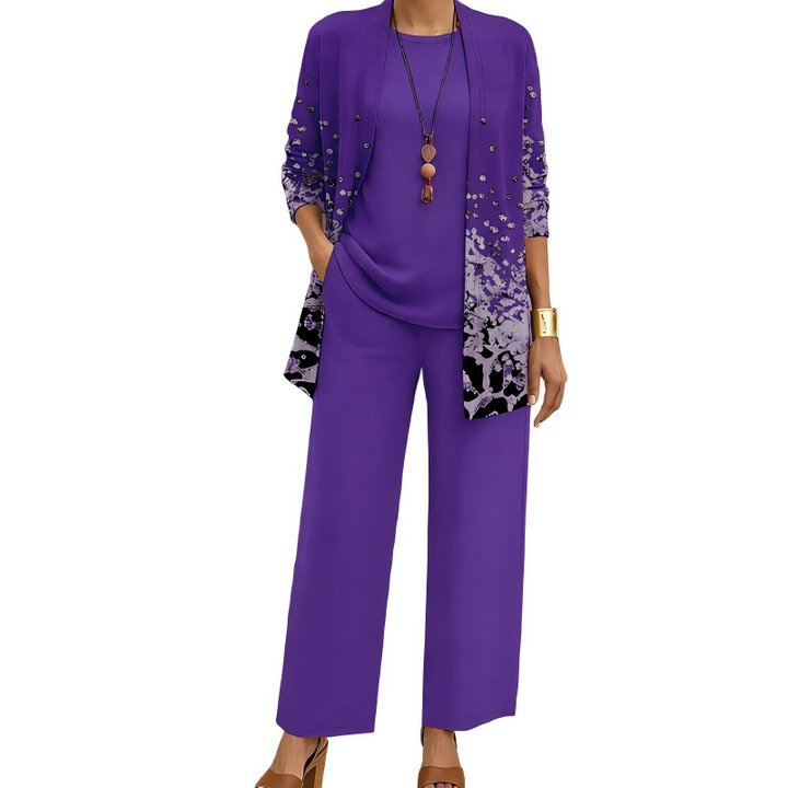 Version violet intense, cardigan long à motif dégradé de taches claires et noires, haut uni et pantalon large. 7