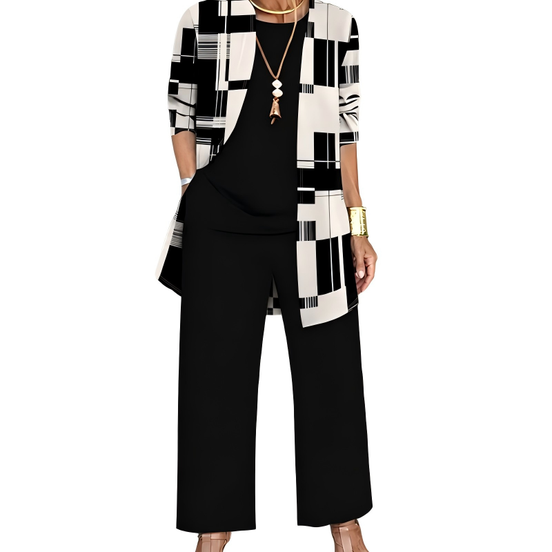Ensemble noir et crème, cardigan long à motif géométrique de blocs et de rayures, haut noir uni et pantalon large noir. 8