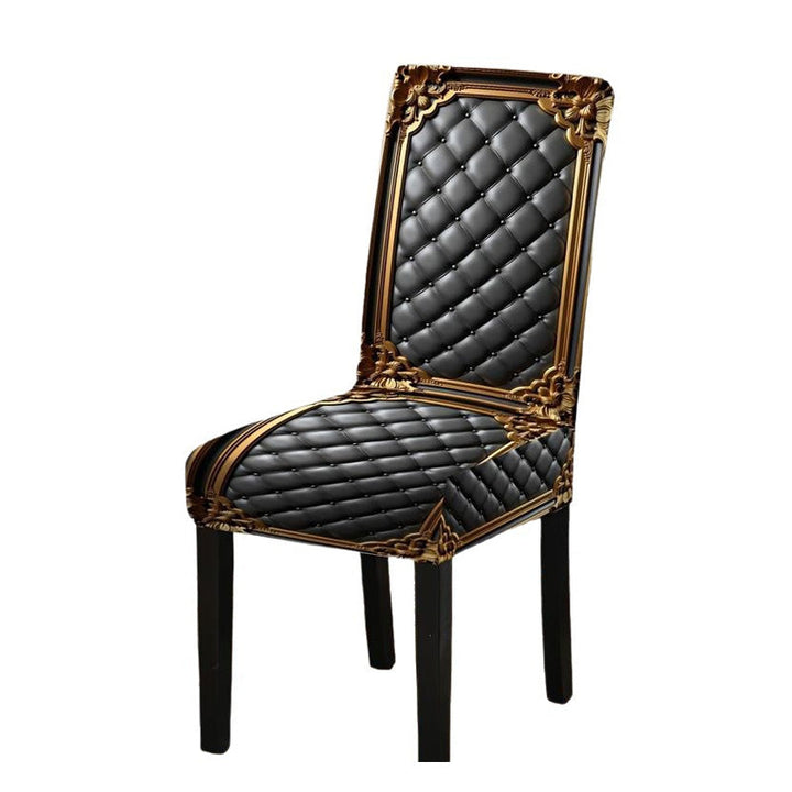 Chaise seule sur fond blanc avec housse noire matelassée à boutons et cadre doré ouvragé, pieds en bois noir. 9