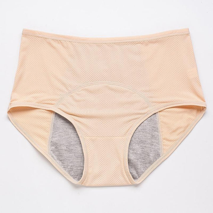 Culotte beige taille haute posée à plat, avec empiècement central arrondi et doublure grise visible sur les côtés. 14