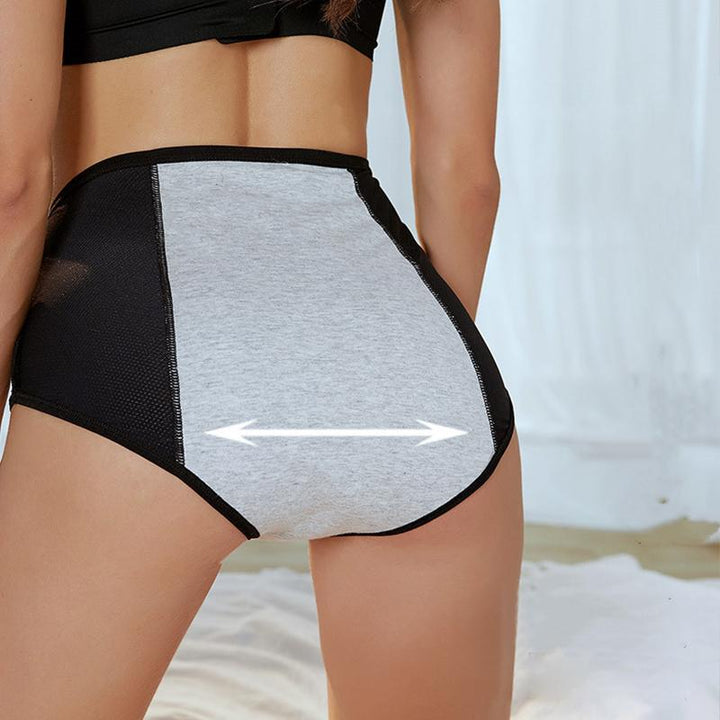Vue de dos d'une culotte noire avec panneau central en tissu gris et flèche indiquant son élasticité. 7