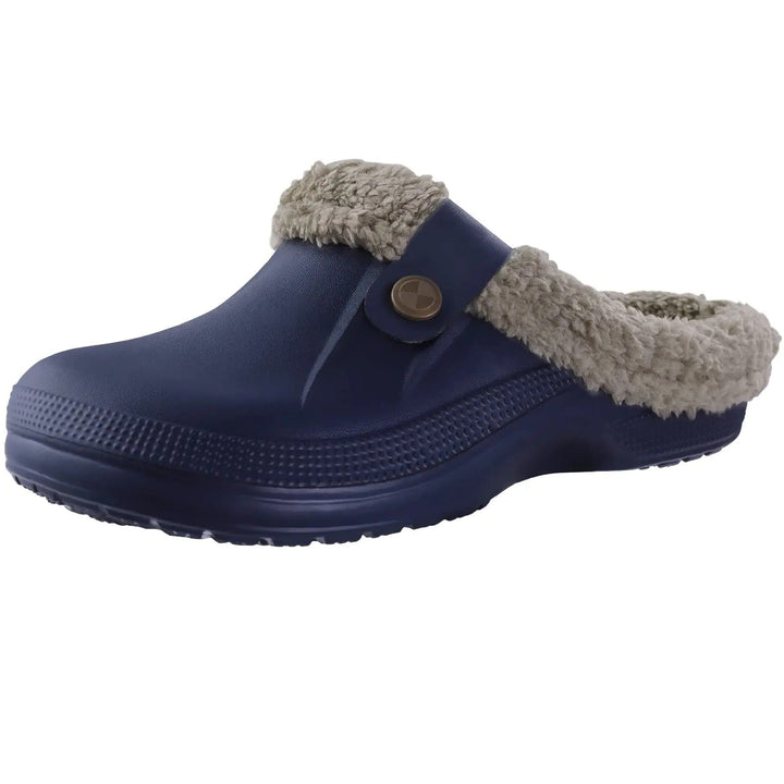 Sabot bleu marine vif à doublure de fausse fourrure beige-grise, semelle crantée, vue de trois quarts 3