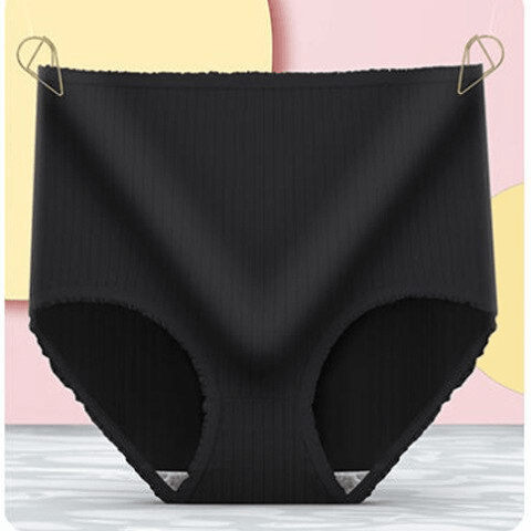 Culotte côtelée noire à taille haute présentée à plat sur un fond rose et jaune. 7